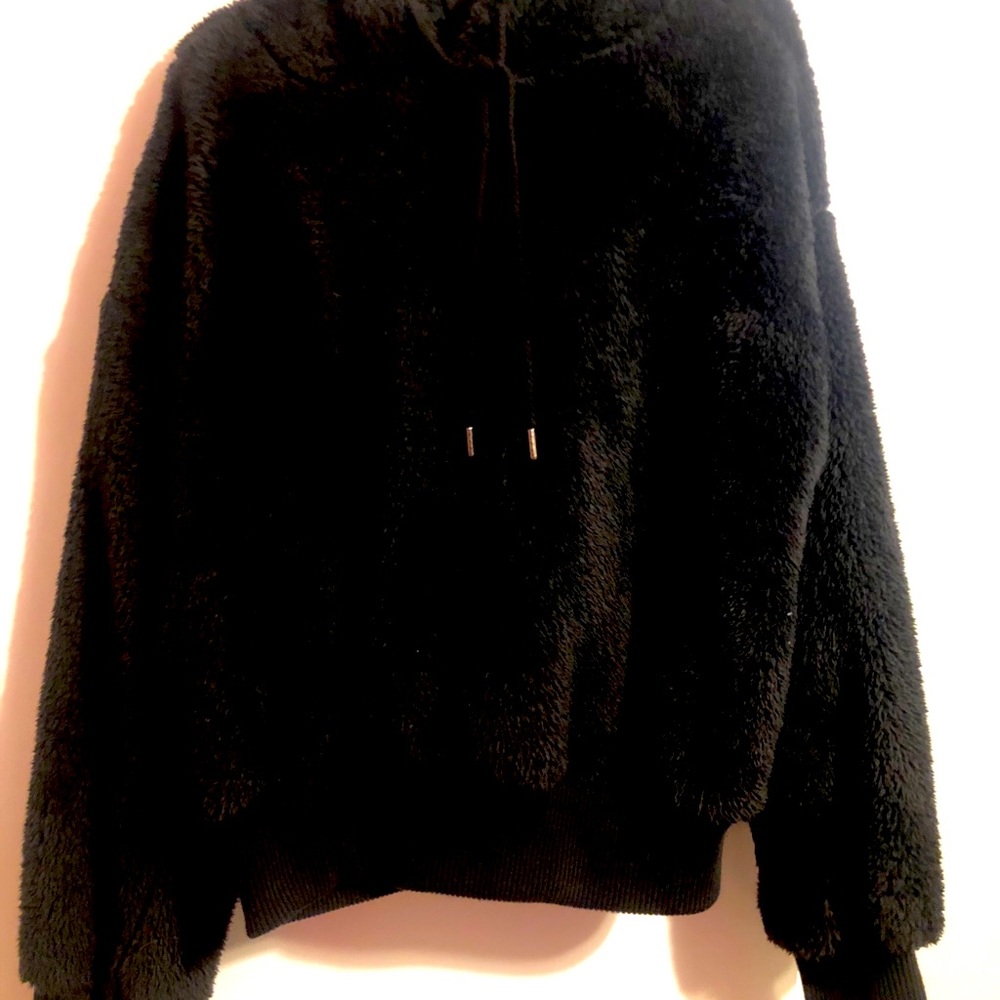 black fluffy jacket kinda cropped